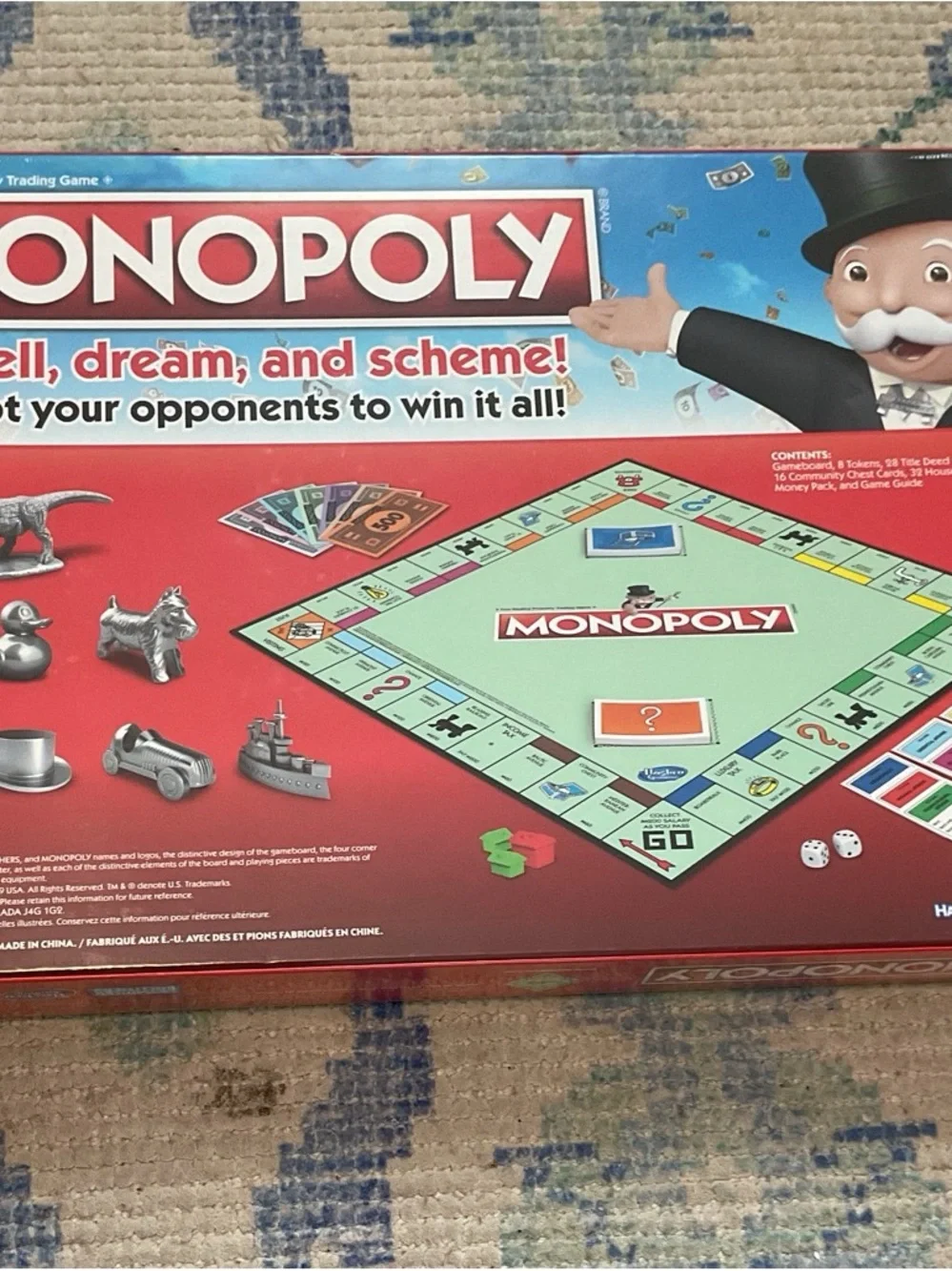 Hasbro Monopoly Game - Red Logo with Green Box and Silver Tokens